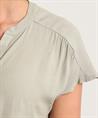 Giulia e Tu blouse kniphals